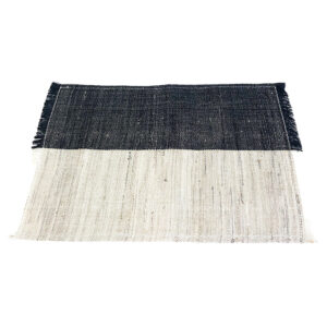 black and stone fringed placemat