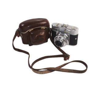 silver vintage camera in brown case
